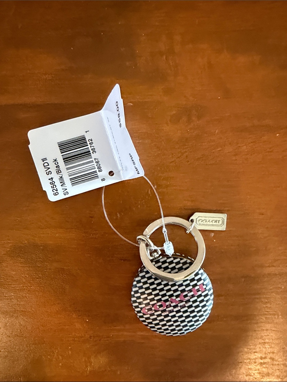 Coach Black & White Woven Logo Disc Keychain with Silver Charm